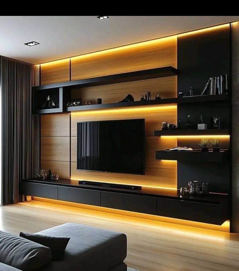 Premium living room TV unit with warm LED lighting designed by M B Interior in Bikaner